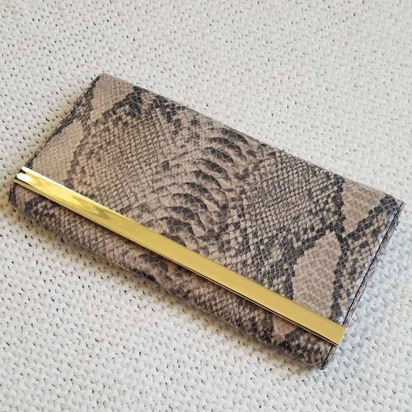 Banana Republic Handbags - Banana Republic Faux Python Envelope Clutch NWT